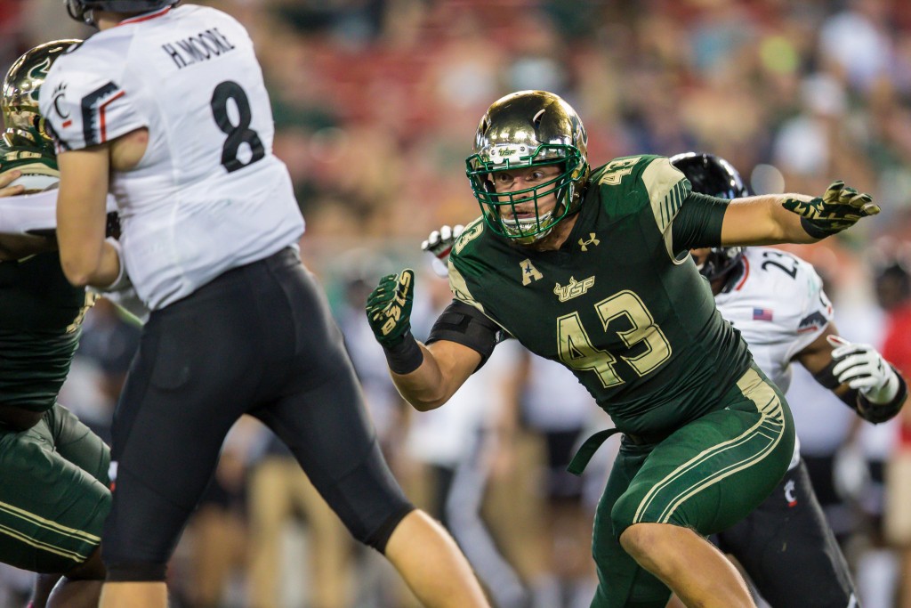 Defense shines, USF becomes bowl  eligible with 33-3 win over Cincinnati