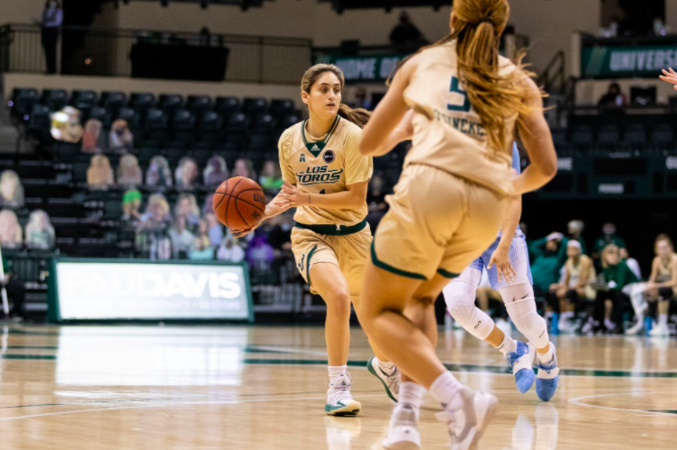 Bulls use hot fourth quarter to beat Tulane, advance to conference championship game